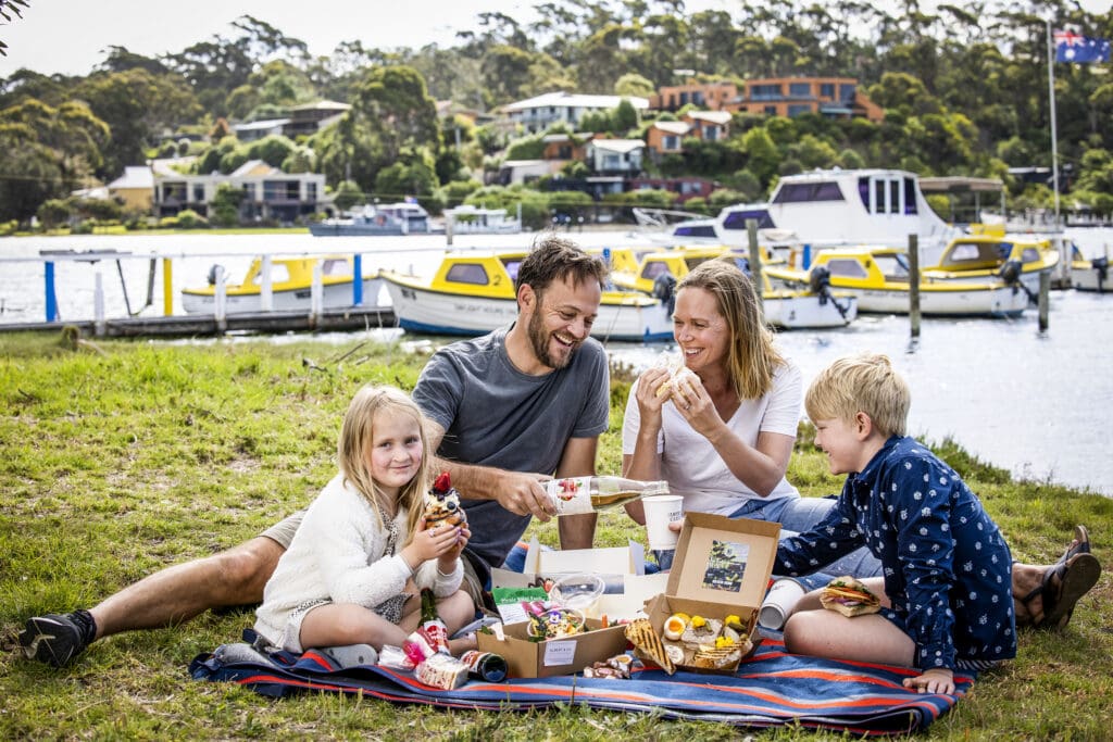 Family picnic on the North Arm of Lakes Entrance