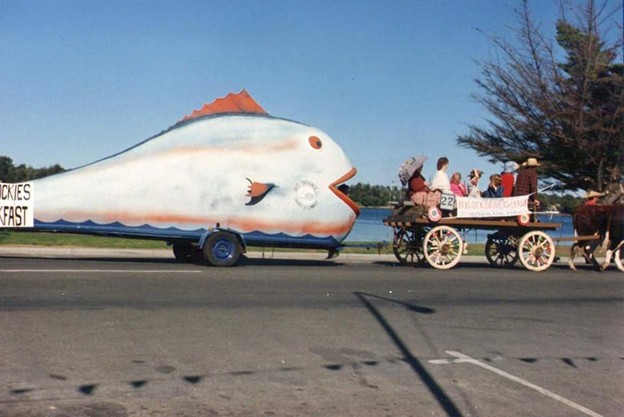 Big Fish statue parade float being pulled by horse and cart. Escape the Ordinary in East Gippsland